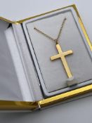 BOXED 9CT YELLOW GOLD CHAIN, SET WITH AN UNSTAMPED GOLD TONE CROSS, CHAIN- 28CM, RRP-£175.