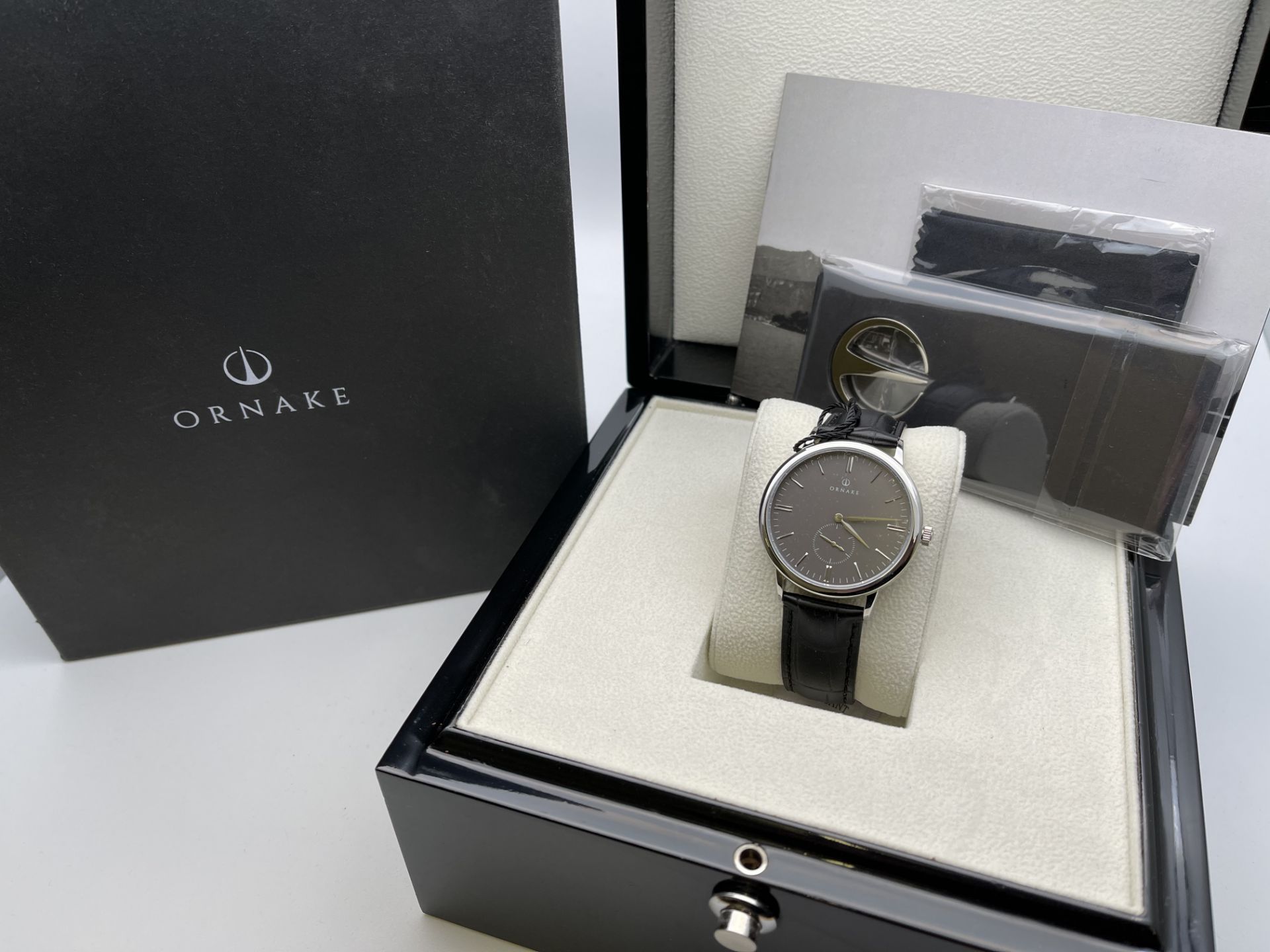 BOXED BRAND NEW GENTS LUXURY TIMEPIECE, MADE BY ORNAKE, GENUINE LEATHER STRAP, WITH SLATE GREY DIAL,