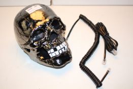 UNBOXED SKULL HOME PHONE Condition ReportAppraisal Available on Request- All Items are Unchecked/