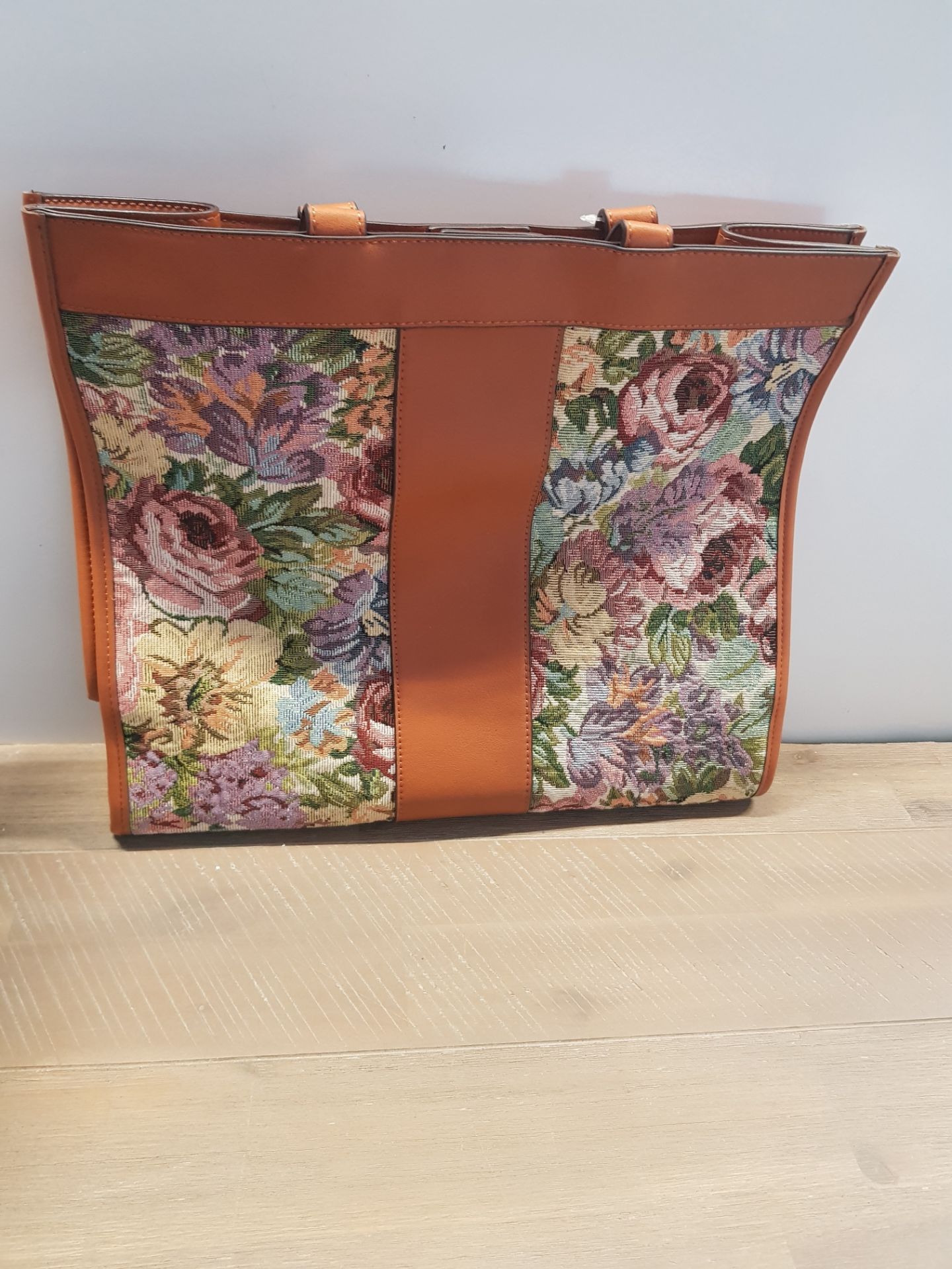1 NEXT TAN LEATHER AND FLOWERY BAG Condition ReportAppraisal Available on Request- All Items are