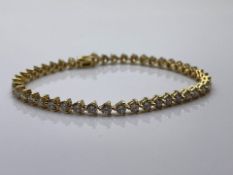 ***£14,410.00*** 18CT YELLOW GOLD DIAMOND LINE BRACELET, SET WITH 5.70 CARATS OF BRILLIANT CUT