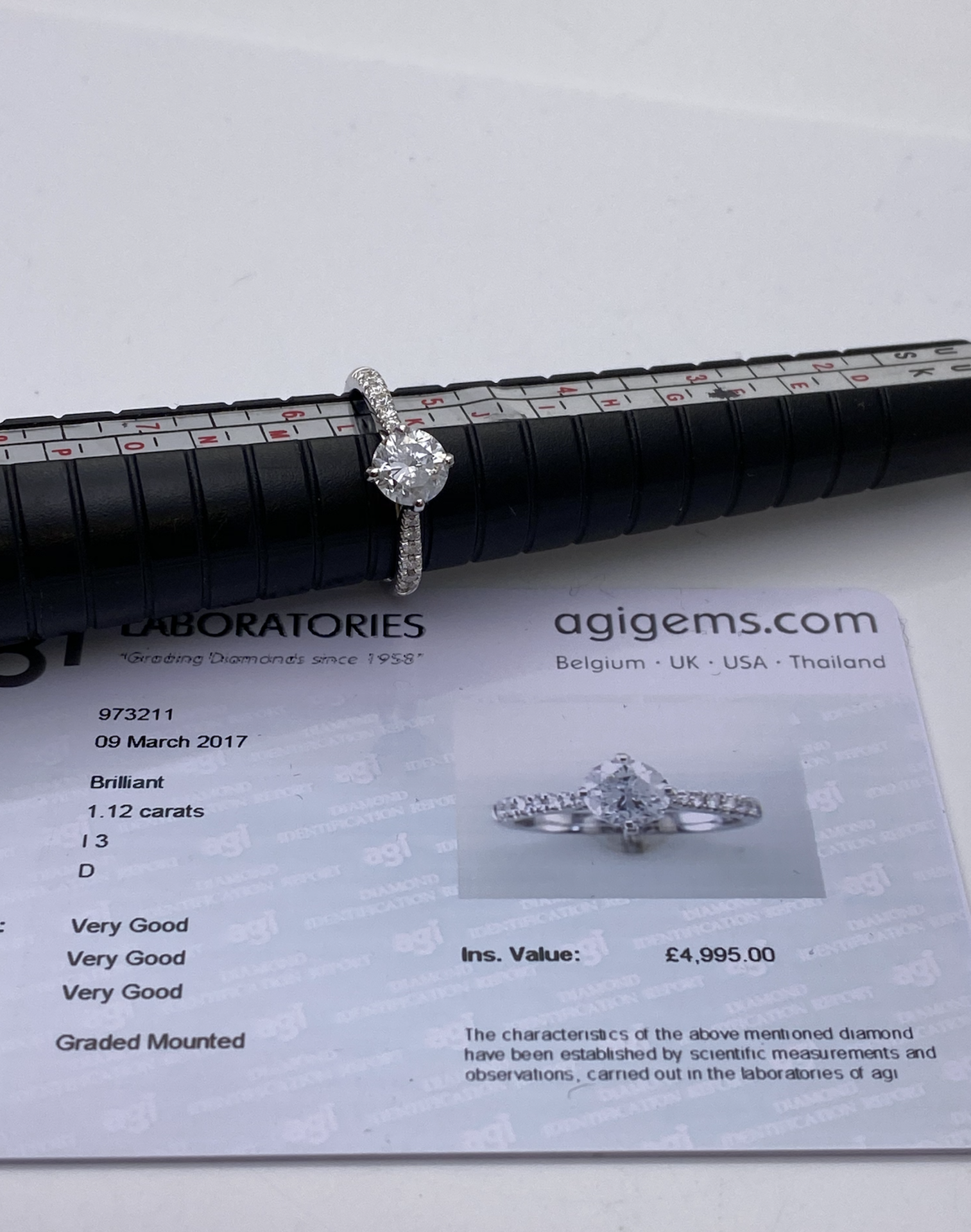 ***£4995.00*** 18CT WHITE GOLD LADIES DIAMOND SOLITAIRE RING SET WITH DIAMONDS ON THE SHANK, TOTAL
