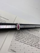 ***£2215.00*** 18CT WHITE GOLD LADIES DIAMOND AND RED SPINEL RING, SET WITH TWELVE ROUND BRILLIANT