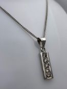 ***£3555.00*** 18CT WHITE GOLD DIAMOND PENDENT, SET WITH FIVE ROUND BRILLIANT CUT DIAMONDS,