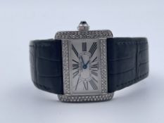 LADIES CATIER DIVAN WATCH, SET WITH A FACTORY SET DIMOND CASE, WATCH ONLY