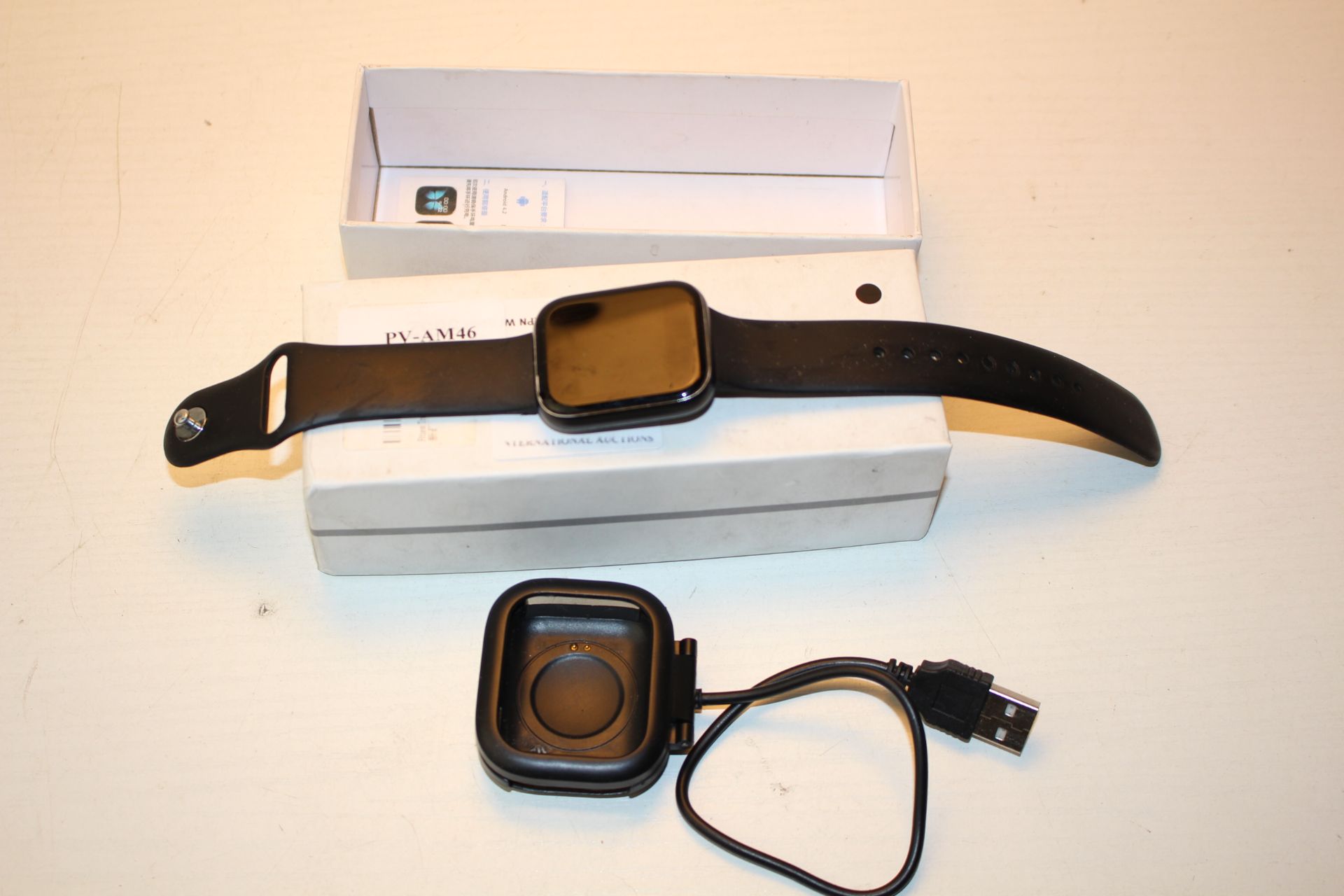 BOXED SMART WATCH WITH CHARGER Condition ReportAppraisal Available on Request- All Items are