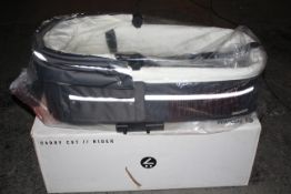 BOXED MUTSY CARRY COT RIDER (IMAGE DEPICTS STOCK)Condition ReportAppraisal Available on Request- All