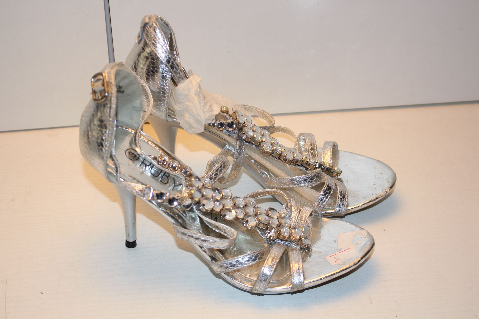 LADIES SILVER HEELED SHOESCondition ReportAppraisal Available on Request- All Items are Unchecked/