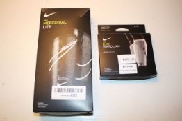 2X BOXED NIKE ITEMS TO INCLUDE MERCURIAL LITE GUARD & ELITE GUARD LOCK Condition ReportAppraisal