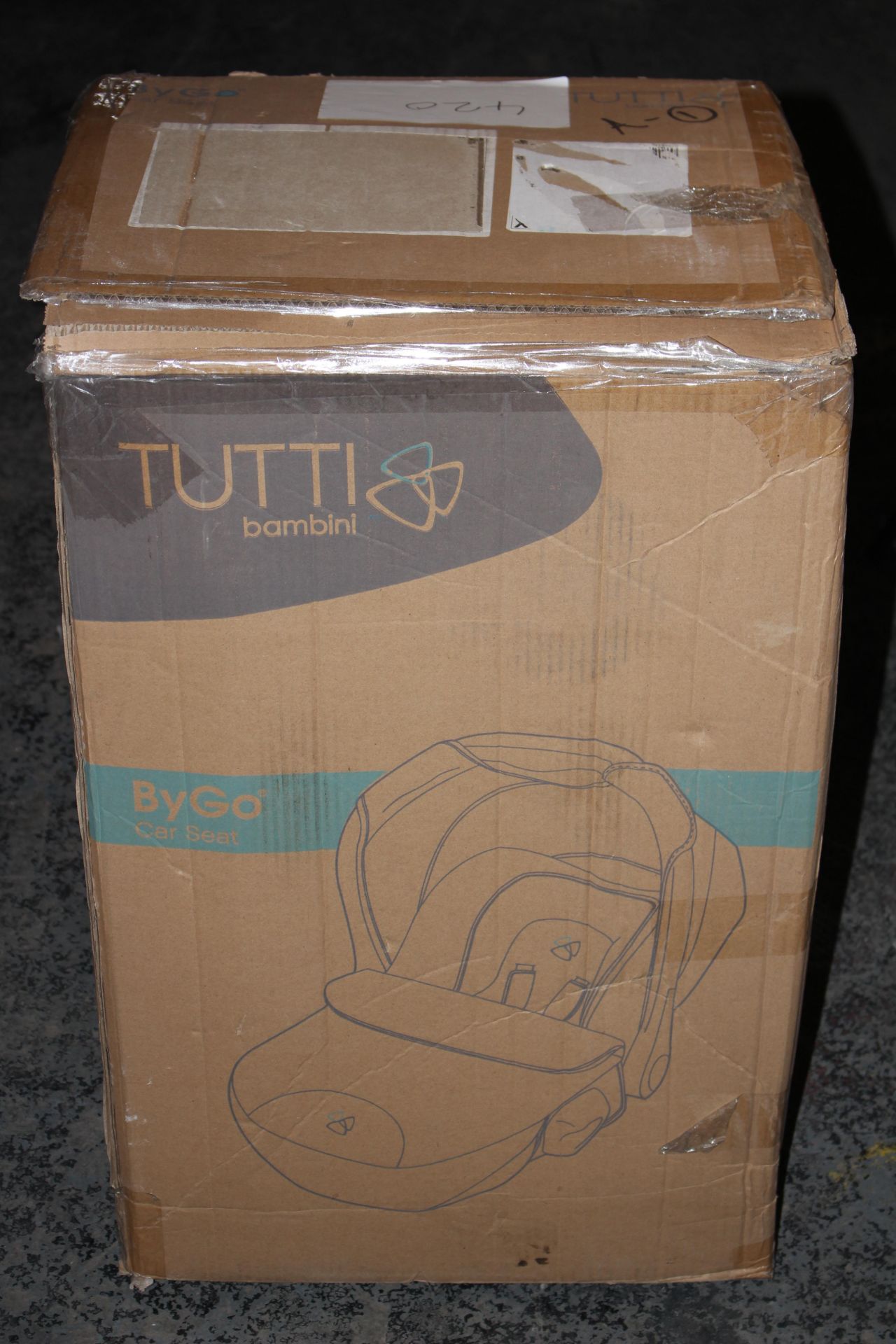 BOXED TUTTI BAMBINI BYGO CAR SEAT RRP £110.00Condition ReportAppraisal Available on Request- All