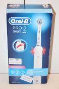 BOXED ORAL B PRO 2 POWERED BY BRAUN 2000 3D WHITE TOOTHBRUSH RRP £29.99Condition ReportAppraisal