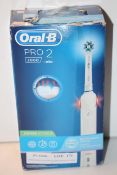 BOXED ORAL B PRO 2 POWERED BY ABRAUN TOOTHBRUSH 2000 RRP £29.99Condition ReportAppraisal Available