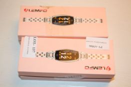 2X BOXED LEMFO LADIES SMART WATCHES Condition ReportAppraisal Available on Request- All Items are