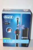 BOXED ORAL B POWERED BY BRAUN PRO 2 2500 BLACK EDITION TOOTHBRUSH RRP £36.00Condition
