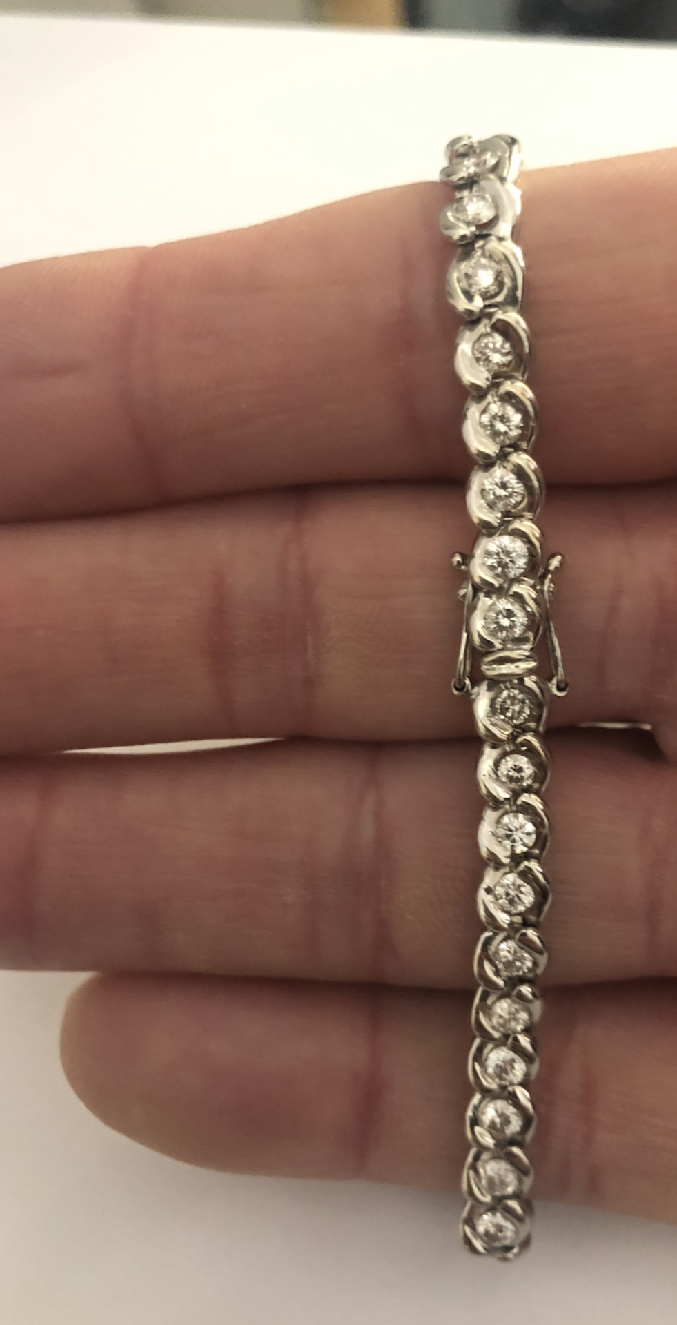 Type: Bracelet Precious Metal: 18 carat white gold Precious Stones: Diamonds Description: 18 carat