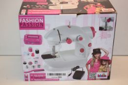 BOXED FASHION PASSION KIDS SEWING MACHINE RRP £39.99Condition ReportAppraisal Available on