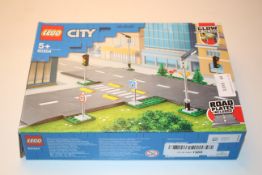 BOXED LEGO CITY ROAD PLATES 60304 RRP £18.00Condition ReportAppraisal Available on Request- All