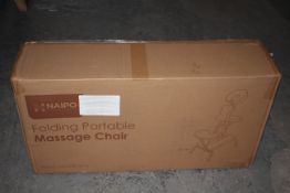 BOXED NAIPO FOLDING PORTABLE MASSAGE CHAIR Condition ReportAppraisal Available on Request- All Items