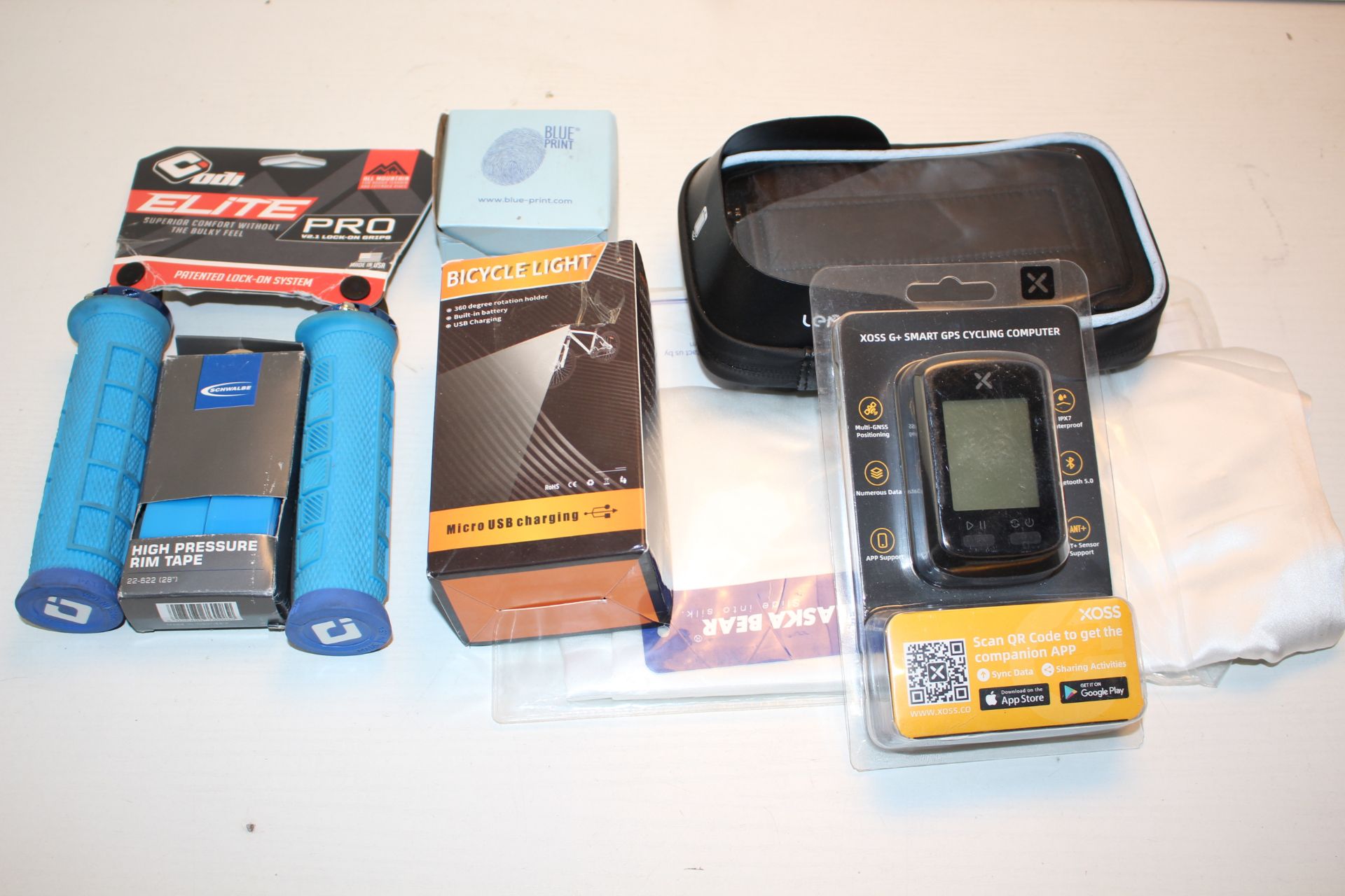 7X ASSORTED ITEMS TO INCLUDE XOSS G+ GPS CYCLING COMPUTER & OTHER (IMAGE DEPICTS STOCK)Condition
