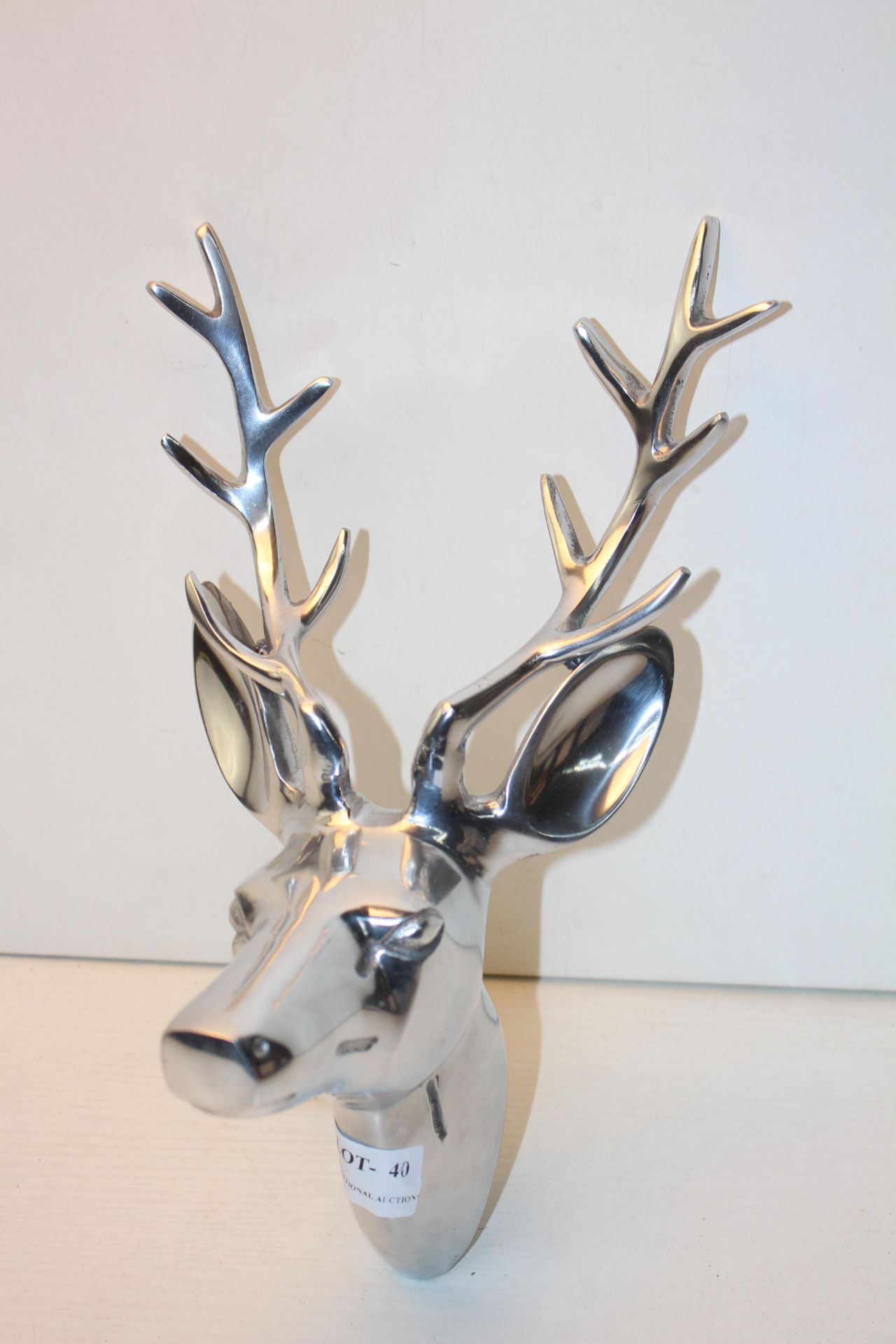 UNBOXED DEAR HEAD WITH ANTLERS IN METAL SILVER LOOK Condition ReportAppraisal Available on