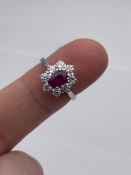 ***£10,375.00*** 18CT WHITE GOLD LADIES DIAMOND AND RUBY RING, SET WITH 1.00CT OVAL RUBY, 0.90