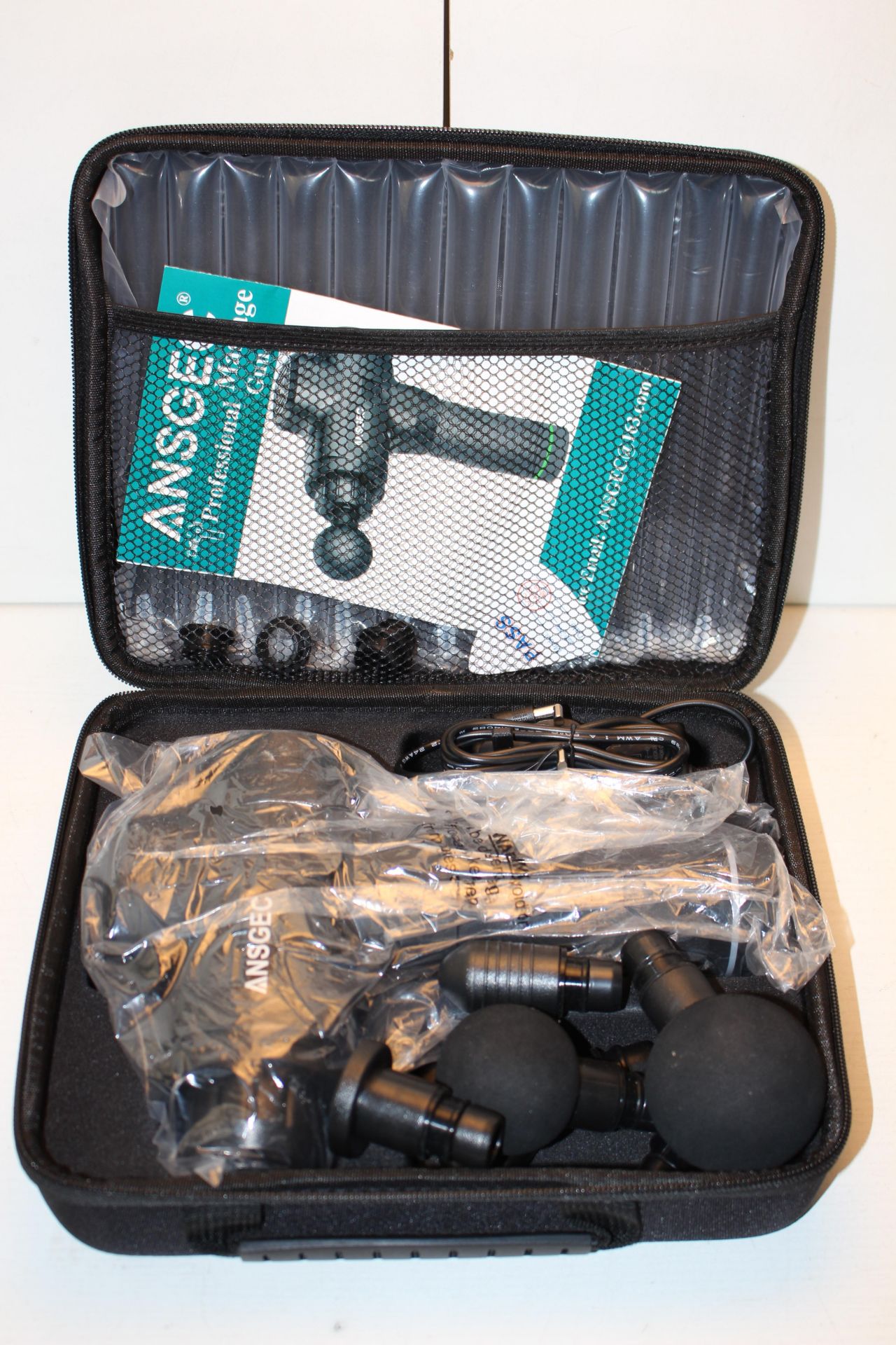 UNBOXED WITH CASE MASSAGE GUN RRP £67.99Condition ReportAppraisal Available on Request- All Items