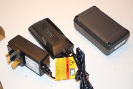 FLYMO BOXED CHARGER AND BATTERY (IMAGE DEPICTS STOCK)Condition ReportAppraisal Available on Request-