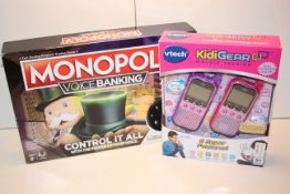 2X BOXED ASSORTED ITEMS TO INCLUDE VTECH KIDIGEAR WALKIE TALKIES & MONOPOLY Condition