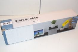 BOXED GEEZY DISPLAY RACK 30 X 10 X 5 CM Condition ReportAppraisal Available on Request- All Items