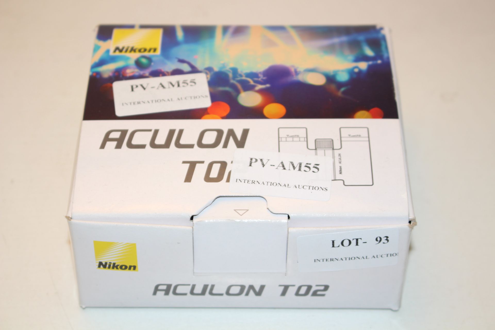 BOXED NIKON ACULON T02 SLIM COMPACT BINOCULARS RRP £59.99Condition ReportAppraisal Available on