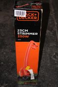 BOXED BLACK + DECKER 23CM STRIMMER 250W RRP £25.90Condition ReportAppraisal Available on Request-