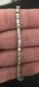 18 carat White Gold Bracelet set with 5 carats of Princess Cut Diamonds