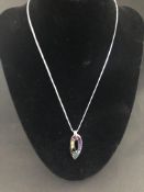 Platinum Necklace and Pending with Aqua Marine, Amethyst, Citrines and Rubies set in a Rainbow style