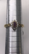 18ct Yellow Gold Ruby and Diamond Halo Ring