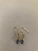 Drop Earrings 2 x 1 carat Oval shaped Sapphires with approx. 0.2 Pave set diamonds