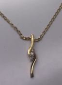 9 carat yellow gold chain and 3 Diamond Pendant set in a 9 carat Yellow Gold