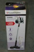 BOXED RUSSELL HOBBS SABRE 18V CORDLESS HAND STICK MODEL: RHHS3001 RRP £120.00Condition