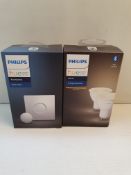 X 2 BOXED PHILIPS HUE ACCESSORIES AND BULB COMBINED RRP £60Condition ReportAppraisal Available on