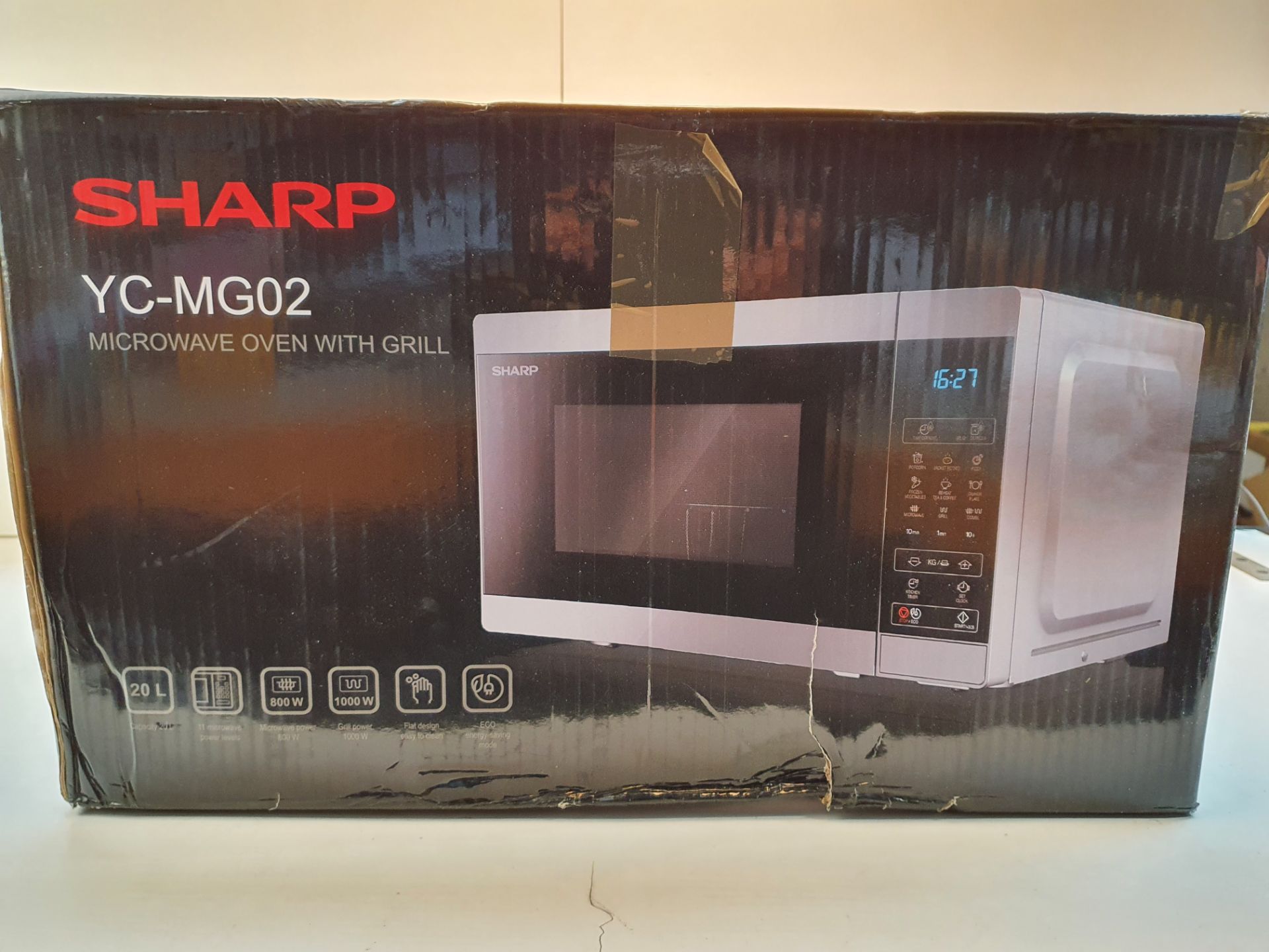 BOXED SHARP YC-MG02 MICROWAVE RRP £89.99Condition ReportAppraisal Available on Request- All Items