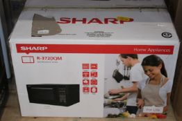 BOXED SHARP R-372 MICROWAVE OVEN RRP £90.00Condition ReportAppraisal Available on Request- All Items