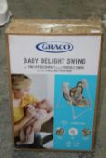 BOXED GRACO BABY DELIGHT SWING RRP £39.95Condition ReportAppraisal Available on Request- All Items