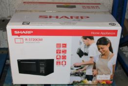 BOXED SHARP R-372 MICROWAVE OVEN RRP £90.00Condition ReportAppraisal Available on Request- All Items