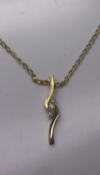 9 carat yellow gold chain and 3 Diamond Pendant set in a 9 carat Yellow Gold