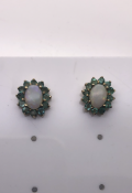 Opal and Emerald earrings set in Yellow Gold