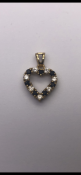 9 carat gold heart pendant set with sapphires and cz No Reserve