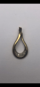 Gold and diamond set pendant