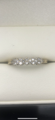 9 carat yellow gold diamond eternity style ring Set with 15 diamonds Size M