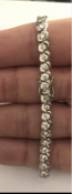 18 carat White Gold Flat Kerb Line Bracelet set with 5 carats of White Round Diamonds