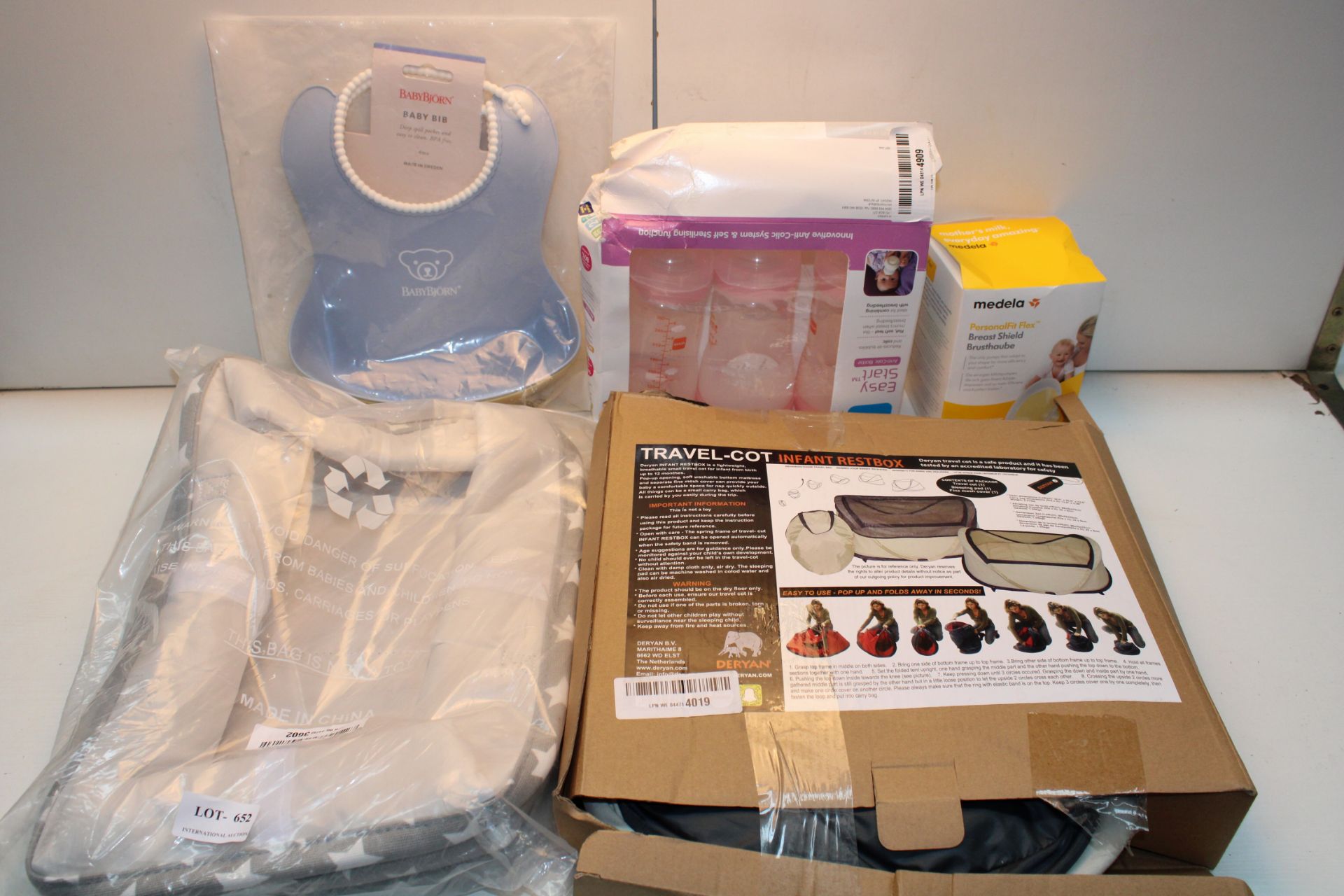 ASSORTED ITEMS TO INCLUDE MEDELA BREAST SHEILD, MAM BOTTLES, PLASTIC BIBS & OTHER Condition