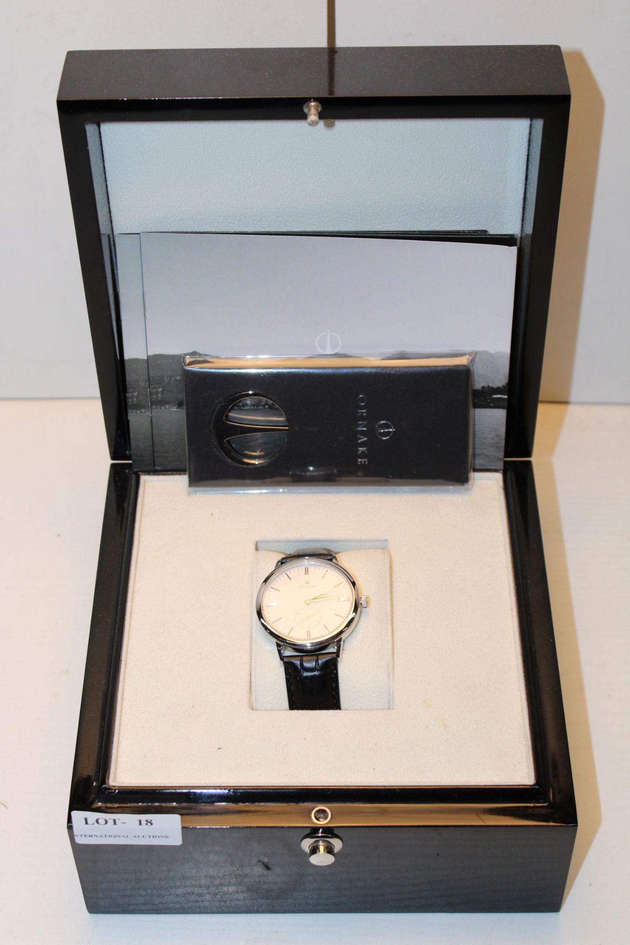 BOXED ORNAKE DESIGNER MENS WRIST WATCH & BLACK LEATHER STRAP WITH HIGH GLOSS BLACK WOODEN CASE